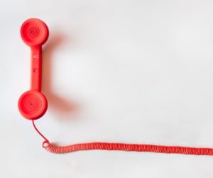 DIfference between hotline pgone numbers and free hotline numbers, explained