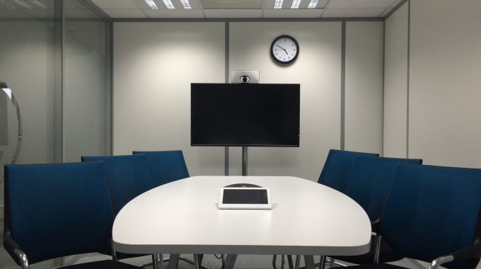 An empty conference room to visualise a teleconference.